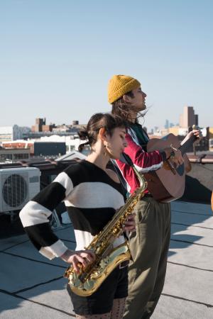 medium-shot-friends-making-music-with-instruments